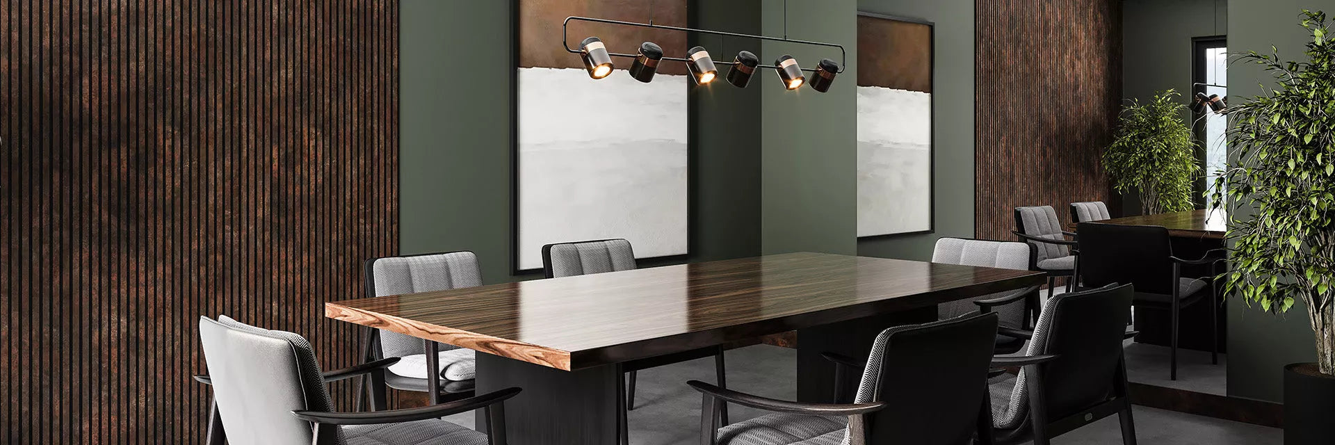 Sala de reuniões com uma mesa de madeira, seis cadeiras acolchoadas com um ambiente contendo plantas ao redor e luzes sob a mesa.